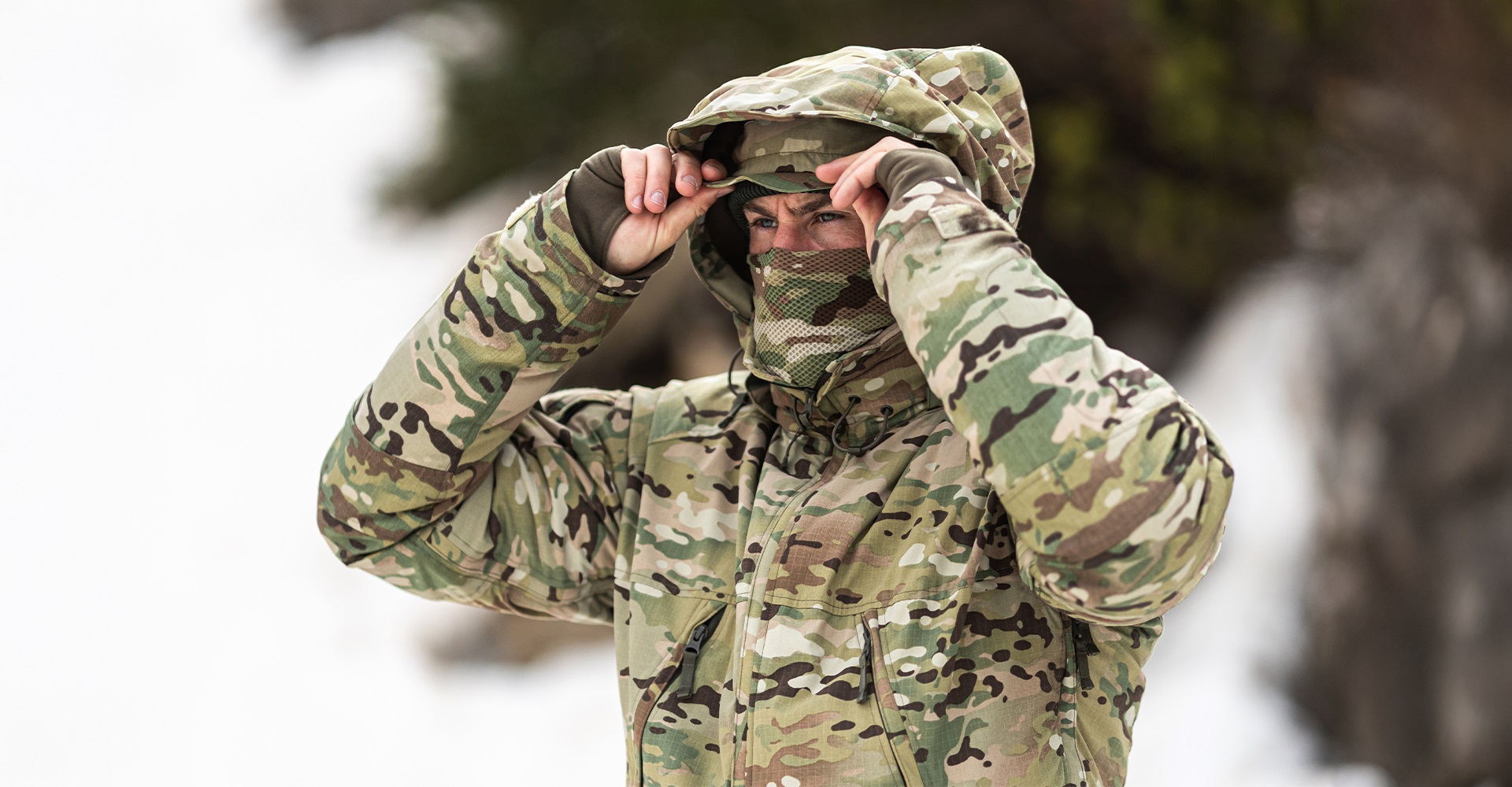 Operator demonstrating the functionality of a hood and harness system in action.