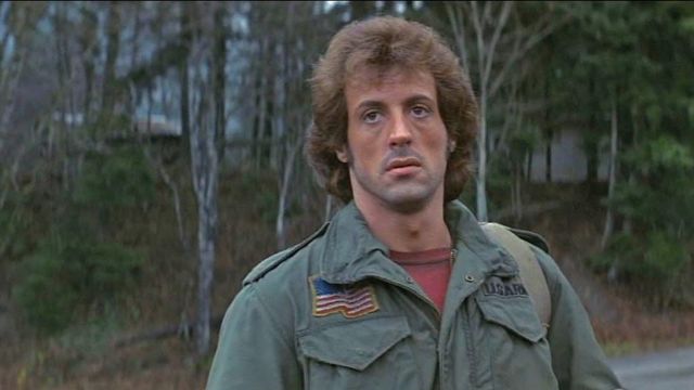 A picture of the movie character Rambo, from the movie First Blood, wearing the M-65 field jacket.
