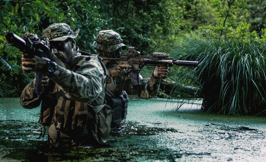 Close-up of a soldier’s camouflage, mimicking jungle textures and patterns for maximum concealment.