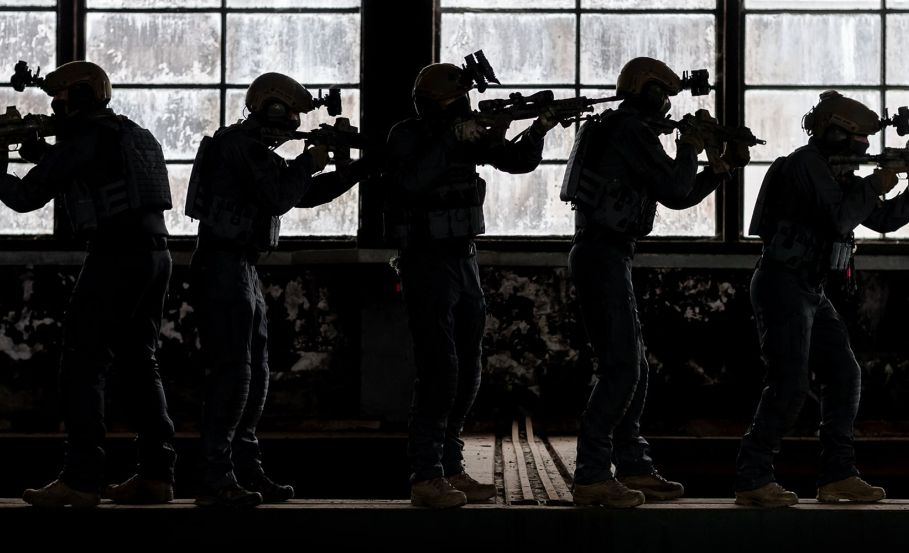 Special forces operators in full combat uniform on a mission inside an abandoned building. What Makes Special Forces So Special?