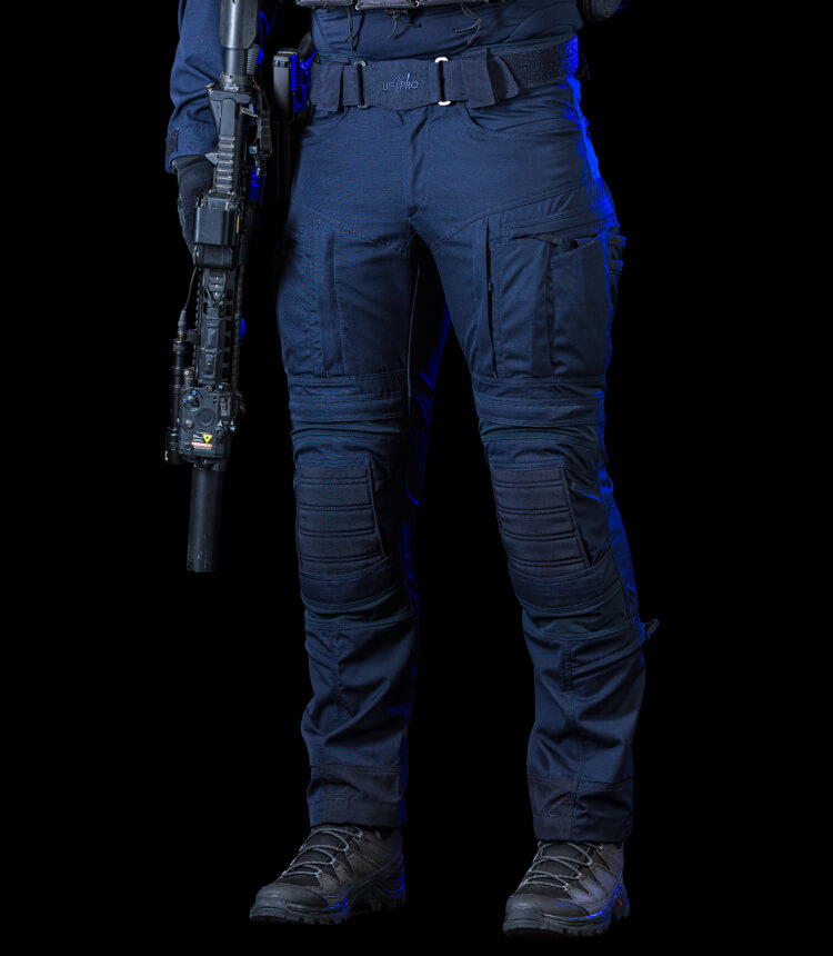 TACTICAL PANTS IN NAVY BLUE  UF PRO Tactical Pants in Navy Blue feature a hybrid material construction, a unique knee protection system, and a strategically designed pocket configuration.