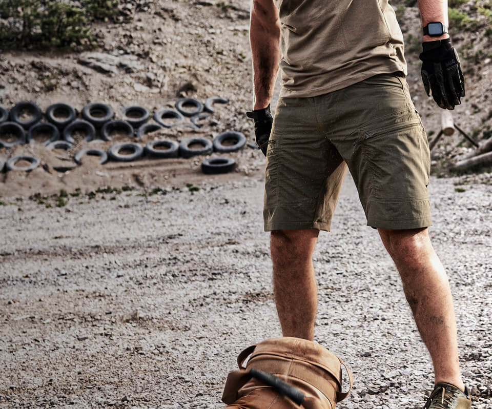 Person wearing P-40 Ranger Tactical Shorts during physical training outdoor.
